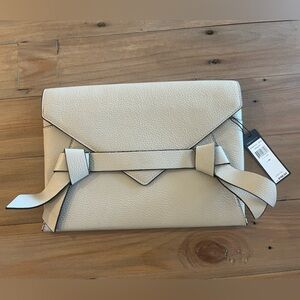 BCBG light grey clutch NWT